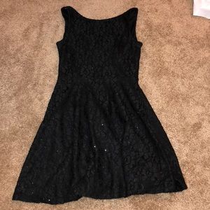Black sparked dress with a lace detail